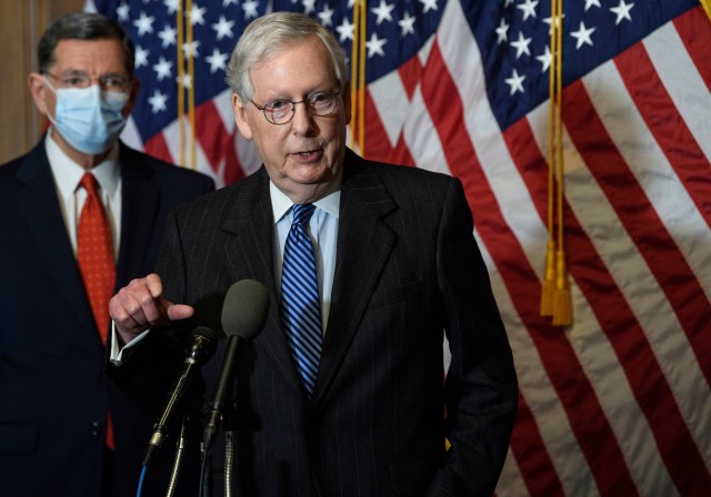 Senate Majority Leader Mitch McConnell, of Kentucky, speaks during a news conference with other Senate Republicans on Capitol Hill in Washington, while Sen. John Barrasso, R-Wyoming, listens at left. (Nicholas Kamm/Pool Photo via AP, File)