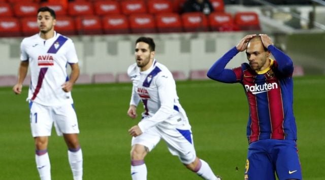 Barcelona's Martin Braithwaite reacts after missing to score from a penalty shot during the Spanish La Liga soccer match between Barcelona and Eibar at the Camp Nou stadium in Barcelona in Barcelona, Spain, Tuesday, Dec. 29, 2020. (AP Photo/Joan Monfort)
