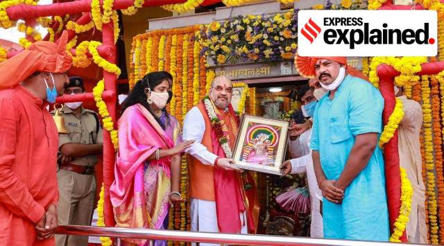  Home Minister Amit Shah being presented with a memento during his visit to Bhagyalakshmi Ammavari Temple, in Hyderabad. (PTI Photo) 