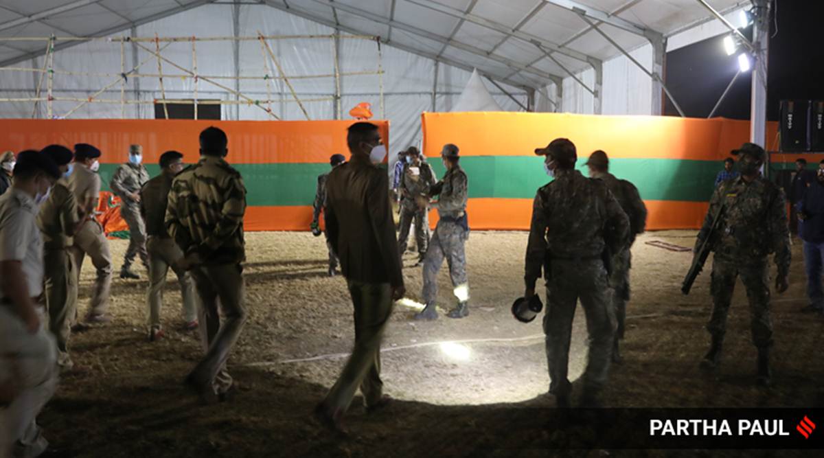 Police officers take stock of security preparations for Amit Shah’s rally at Midnapore College Ground, Friday. (Express photo by Partha Paul)