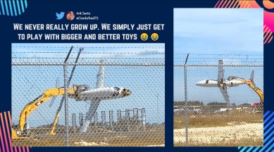 excavator airplane, cat excavator airplane video, excavator flies a airplane video, Vice Aviator excavator airplane video, cat crane takes airplane for ride, learjet last flight crane video, viral videos, trending news, indian express news
