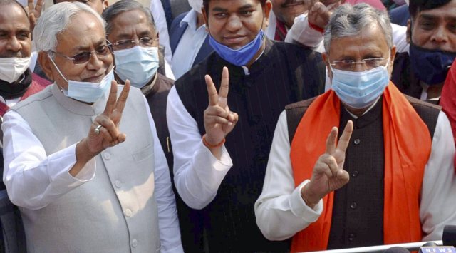 Patna: Former Deputy CM Sushil Kumar Modi flashes the victory sign with Bihar Chief Minister Nitish Kumar and others after filing his nomination papers for Rajya Sabha as an NDA candidate, in Patna , Wednesday, Dec. 2, 2020. (PTI Photo) (PTI02-12-2020_000057A)