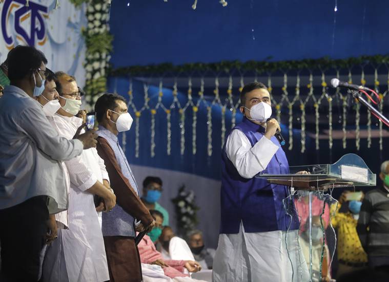Suvendu Adhikari, Mihir Goswami, TMC BJP, Mamata Banerjee, west Bengal elections, bjp Bengal, defections from TMC, Bengal assembly elections, express explained, indian express
