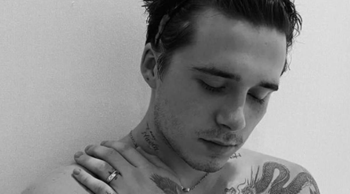 Brooklyn Beckham's neck tattoo is a tribute to fiancee Nicola ...