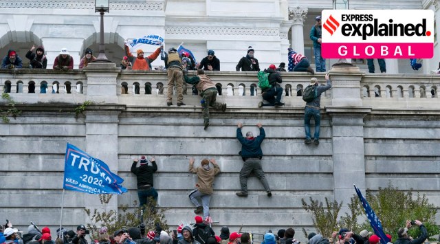 Supporters of President Donald Trump climb the west wall of the the US Capitol on Wednesday, Jan. 6, 2021, in Washington. (AP Photo: Jose Luis Magana)