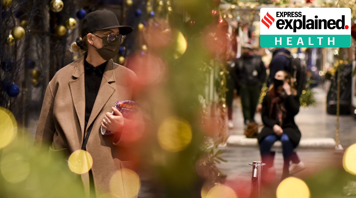 Shoppers wear face masks at the Burlington Arcade in London, Tuesday, Dec. 22, 2020. Britain's government has imposed new restrictions across many regions, in an effort to restrict the spread of the new mutant coronavirus variant during Christmas festivities. (AP Photo: Alberto Pezzali)