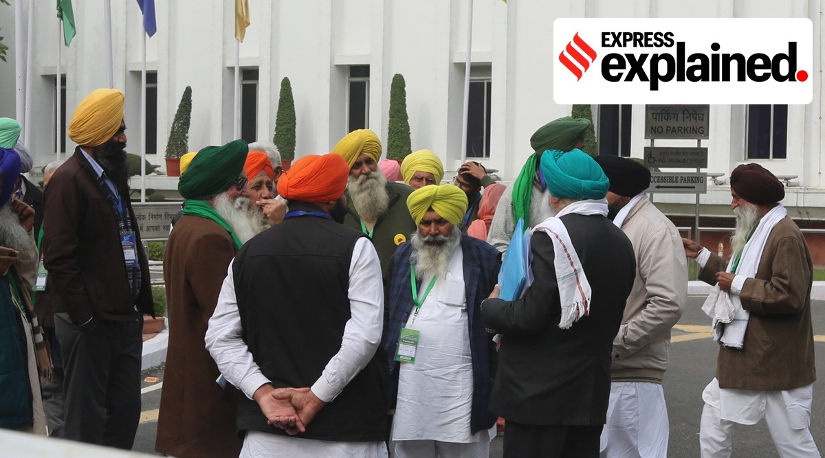Farmers outside Vigyan Bhawan in New Delhi on Friday. (Express Photo: Prem Nath Pandey)