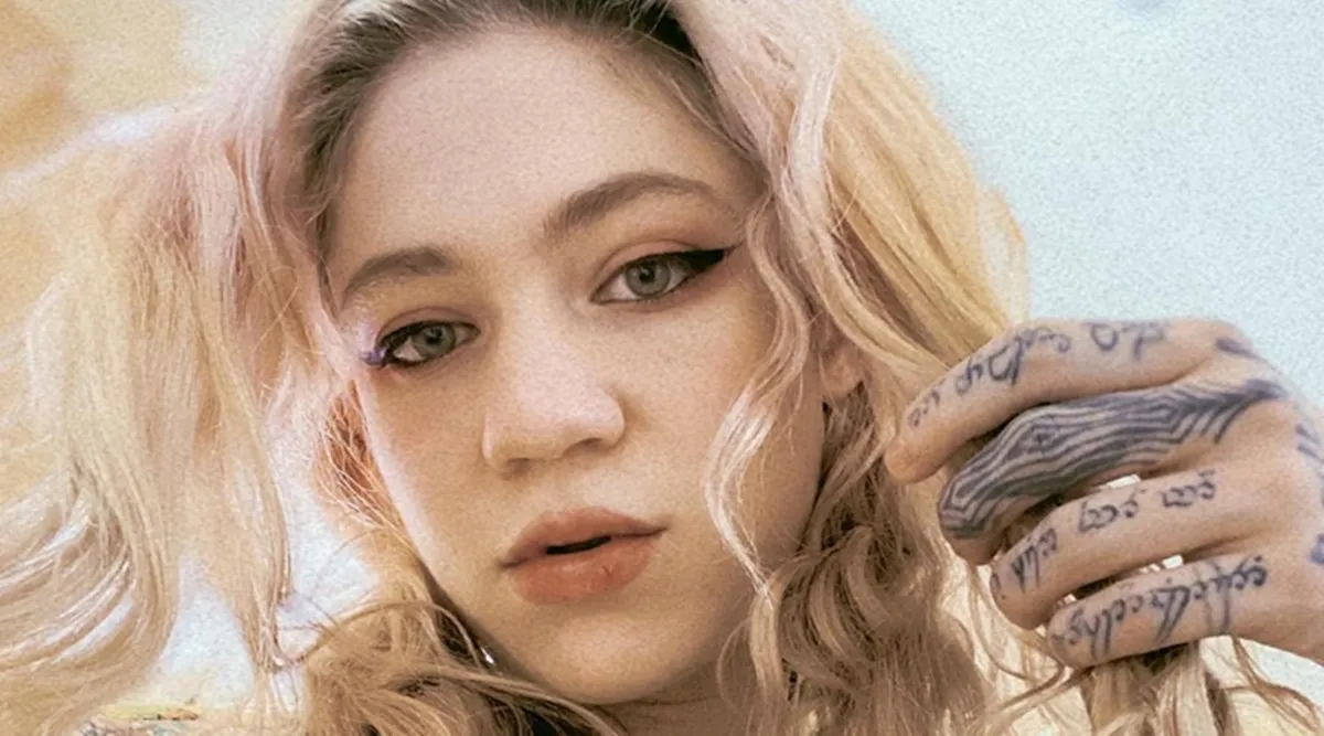 Singer Grimes sells digital art collection for .8 million in just 20 minutes