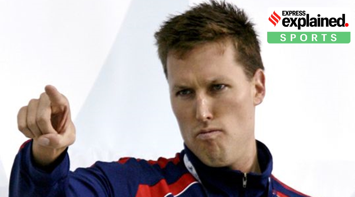 Klete Keller of the U.S. stands with his gold medal after the men's 200m freestyle event at the Pan Pacific 2006 swimming championships in Victoria, August 17, 2006. (Reuters)
