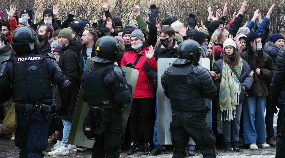 Protesters stand surrounded by police during a protest against the jailing of opposition leader Alexei Navalny in St. Petersburg, Russia, Sunday, Jan. 31, 2021. Thousands of people took to the streets Sunday across Russia to demand the release of jailed opposition leader Alexei Navalny, keeping up the wave of nationwide protests that have rattled the Kremlin. Hundreds were detained by police. (Photo: AP/Dmitri Lovetsky)