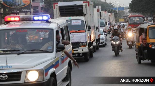 The convoy of Covid vaccine transport vehicles arriving at Serum Institute of India escorted by  police on Monday. (Express photo by Arul Horizon)