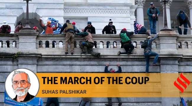 Supporters of President Donald Trump climb the west wall of the the US Capitol on Wednesday, Jan. 6, 2021, in Washington. (AP Photo: Jose Luis Magana)