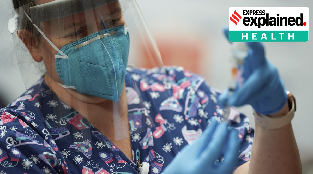 A health care worker prepares a coronavirus vaccine at a hospital in Mount Pleasant, Texas Dec. 21, 2020. (The New York Times: Cooper Neill)