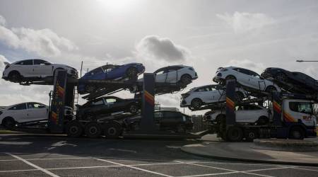 Newly manufactured Honda Civic automobiles sit on a car transporter at the Honda Motor Co. auto plant in Swindon, UK, on Tuesday, Feb. 19, 2019. (Image source: Bloomberg)