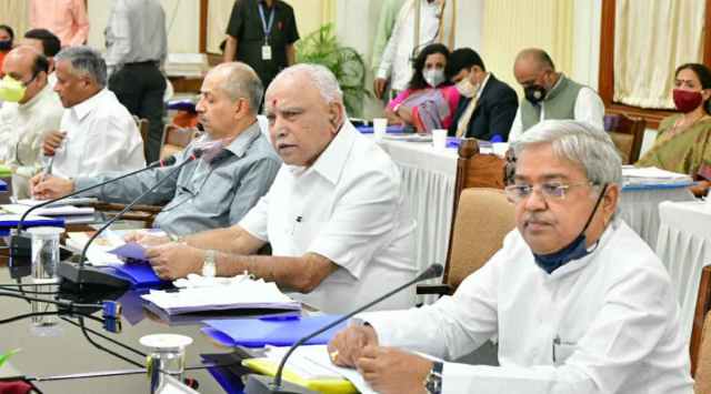 Karnataka Deputy CM Govind Karjol with CM B S Yediyurappa. (Photo: Twitter @GovindKarjol)
