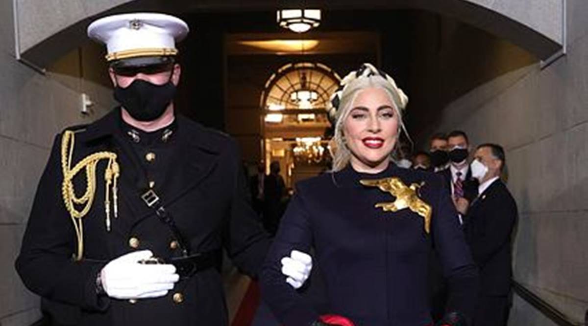 Lady Gaga's gold dove brooch reminds social media of Hunger Games | Fashion  News - The Indian Express