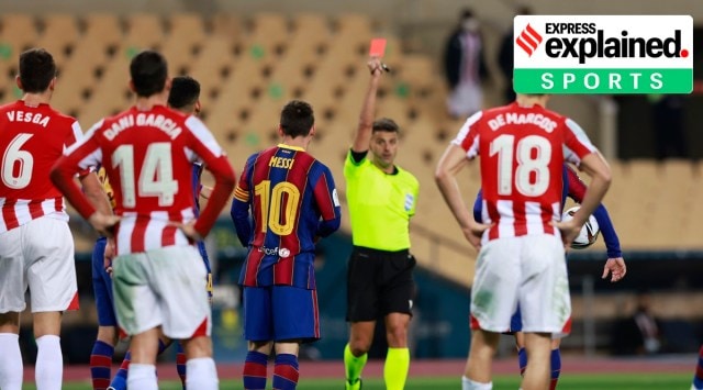 Barcelona's Lionel Messi is shown a red card by referee Jesus Gil Manzano. Reuters Photo