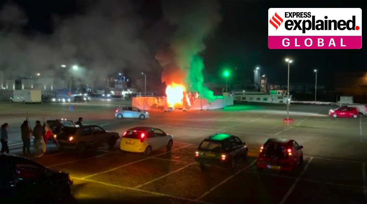 A COVID-19 testing center is seen after being set on fire in Urk, 80 kilometers (50 miles) northeast of Amsterdam, Saturday, Jan. 23, 2021. (Pro News via AP)