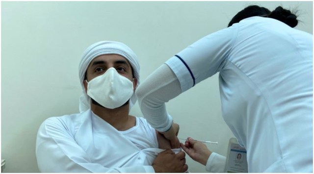 FILE PHOTO: A man receives a dose of a vaccine against the coronavirus disease (COVID-19), in Dubai, United Arab Emirates December 28, 2020. REUTERS/Abdel Hadi Ramahi
