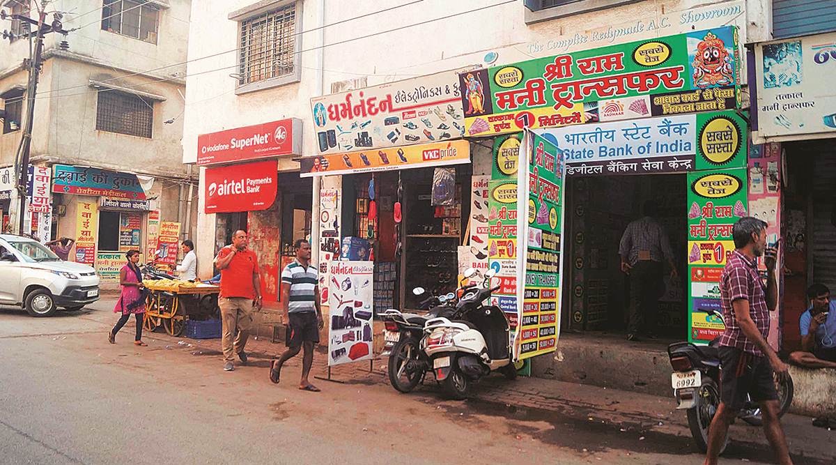 With workers sending money back home, money transfer shops have started doing good business again in Surat’s industrial areas. (Express photo by Kamal Saiyed)