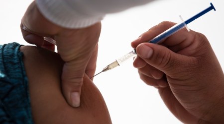 A health worker gets a shot of the Pfizer-BioNTech vaccine for Covid-19. (AP Photo: Marco Ugarte, File)