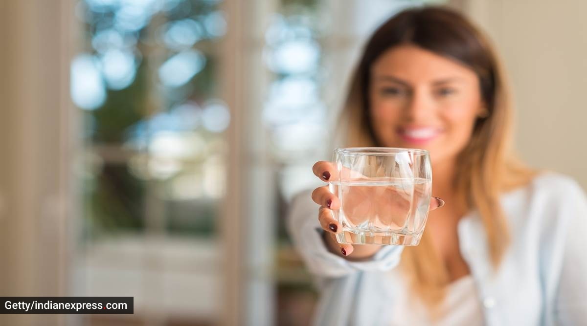 Here's how many glasses of water you should really be drinking a day for  'peak health,' says nutritionist