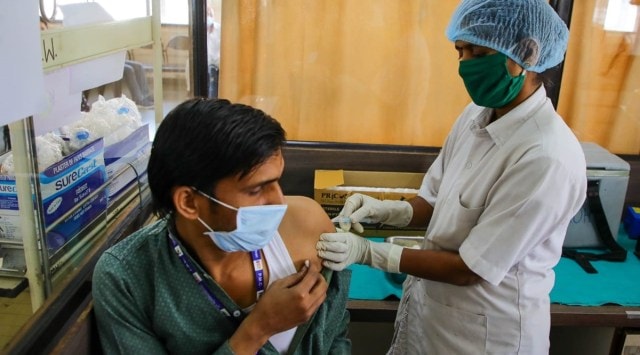 Beneficiaries receive the second dose of Covishield Vaccine on Monday at Kamala Nehru Hospital. (Express photo by Ashish Kale)