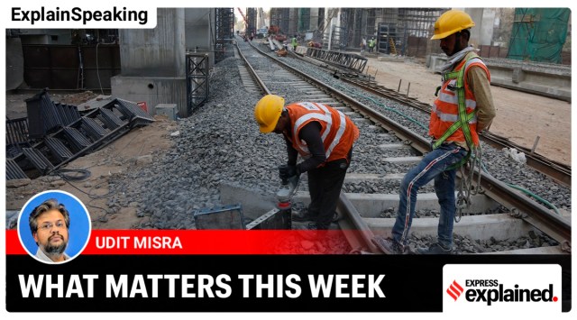 Labourers work at a Metro Rail project site in Ahmedabad (AP/File)