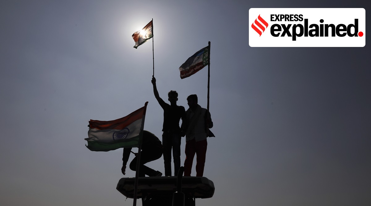 Farmers stand atop tractors during a protest on an expressway at Kundli in Haryana, Saturday, Feb. 6, 2021. (AP Photo: Manish Swarup)