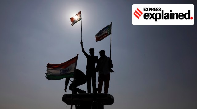 Farmers stand atop tractors during a protest on an expressway at Kundli in Haryana, Saturday, Feb. 6, 2021. (AP Photo: Manish Swarup)