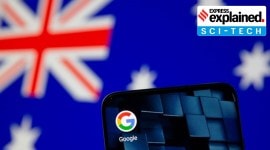 FILE PHOTO: Smartphone with google app icon is seen in front of the displayed Australian flag in this illustration taken no alt set