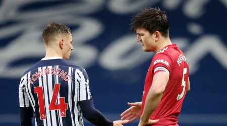 Soccer Football - Premier League - West Bromwich Albion v Manchester United - The Hawthorns, West Bromwich, Britain - February 14, 2021 Manchester United's Harry Maguire and West Bromwich Albion's Conor Townsend after the match Pool via REUTERS/Nick Potts EDITORIAL USE ONLY. No use with unauthorized audio, video, data, fixture lists, club/league logos or 'live' services. Online in-match use limited to 75 images, no video emulation. No use in betting, games or single club /league/player publications.  Please contact your account representative for further details.