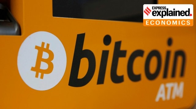 At ATM in Hong Kong displays the Bitcoin logo. Tesla says it has invested more than $1 billion in Bitcoin and will accept the digital currency as payment for its electric vehicles. In a regulatory filing Monday.  (File/AP Photo)