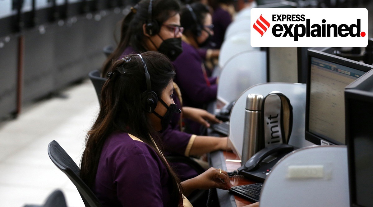 Workers wearing protective masks at a call centre in Uttar Pradesh (Express photo by Vishal Srivastav)
