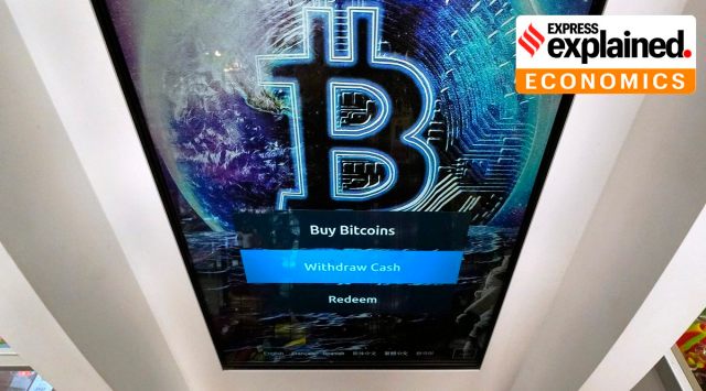 The Bitcoin logo appears on the display screen of a crypto currency ATM in New Hampshire. The price of Bitcoin has soared over the past months. (AP Photo)