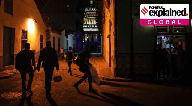 Wearing mask as a precaution against the spread of the new coronavirus people walk to get home before curfew time next to the Capitol in Havana, Cuba. Considered path-breaking, the economic reforms in the country will allow private involvement in most sectors of the complicated Cuban economy, long controlled by the state. (AP Photo / Ramon Espinosa)