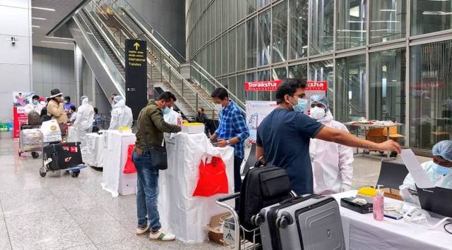 Passengers showing their Covid-19 test reports at designated counters at Kolkata Airport. (Source: Twitter/Kolkata Airport)