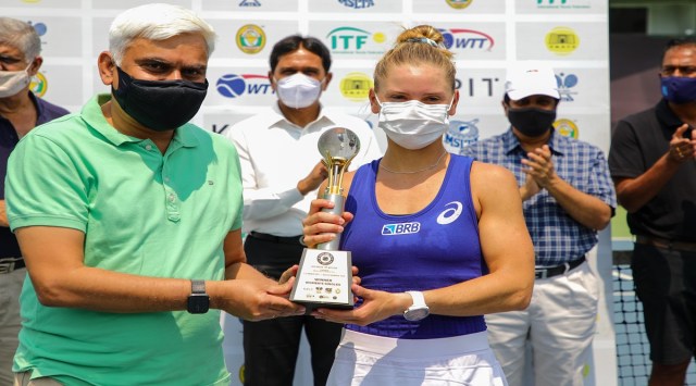 What seemed like a never-ending battle between the best, Brazilian player Laura Pigossi clinched the $25,000 Women’s ITF Championships singles title after a 6-0,3-6,7-6(5) win against Marianna Zakarlyuk of Ukraine at the Deccan Gymkhana tennis courts on Sunday. (Express photo by Ashish Kale)