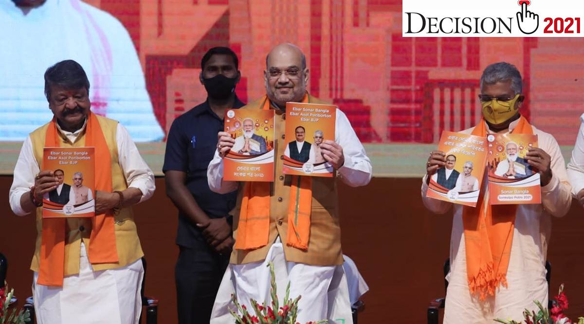 Union Home Minister Amit Shah releases BJP's manifesto for the Bengal polls, in Kolkata on Sunday. (Express photo by Partha Paul)