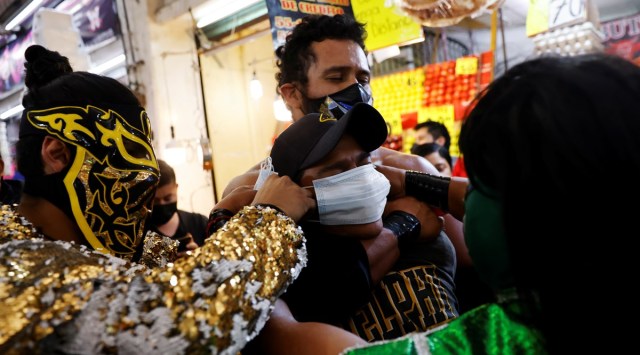 In a fight against COVID, Mexico’s lucha libre wrestlers put masks on ...
