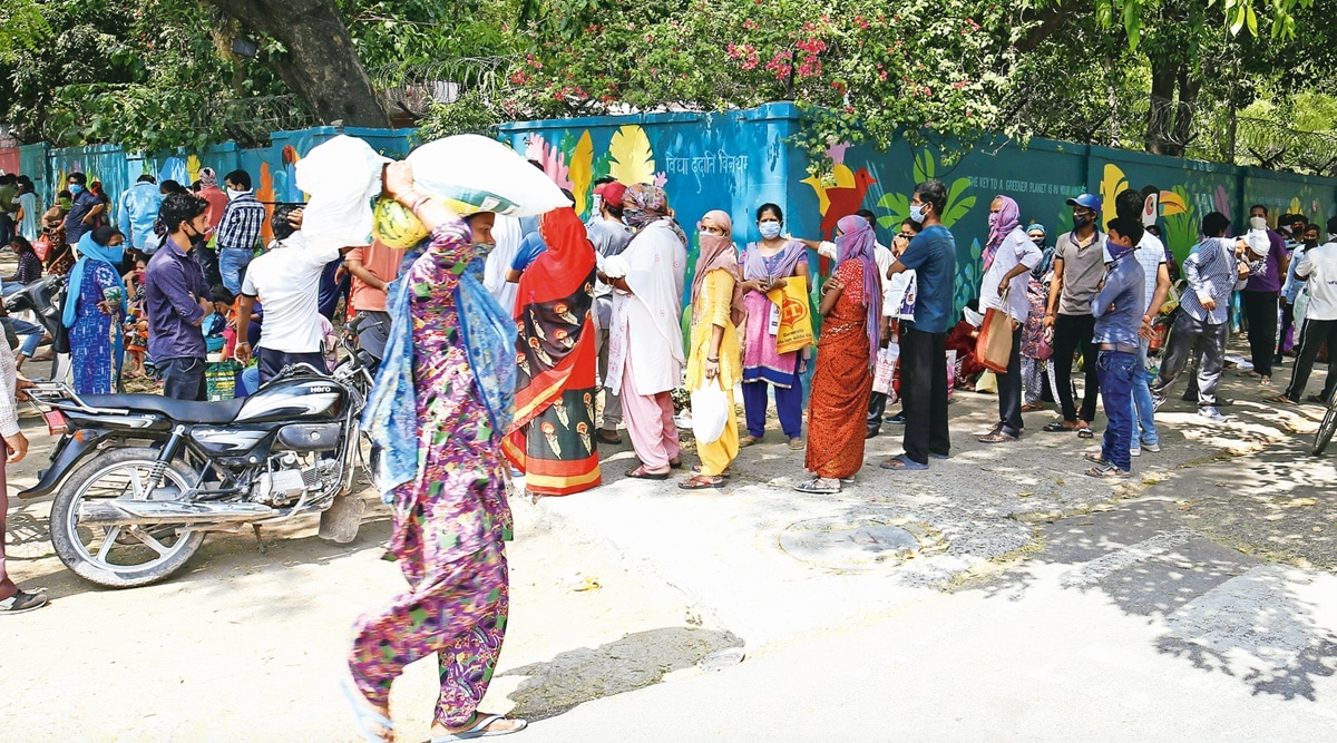 Outside a ration shop. (Express Archive)