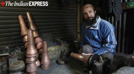 Coppersmiths, coppersmiths in Srinagar, oppersmiths in Kashmir, coppersmiths in the Valley, copperware, coppersmiths making copperware, coppersmiths lockdown pandemic, coppersmiths gallery, coppersmith pictures, coppersmiths news, indian express news