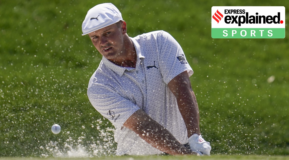 Bryson DeChambeau hits from the bunker on the ninth hole during the final round of The Players Championship golf tournament Sunday, March 14, 2021, in Ponte Vedra Beach, Fla. (AP Photo/Gerald Herbert)
