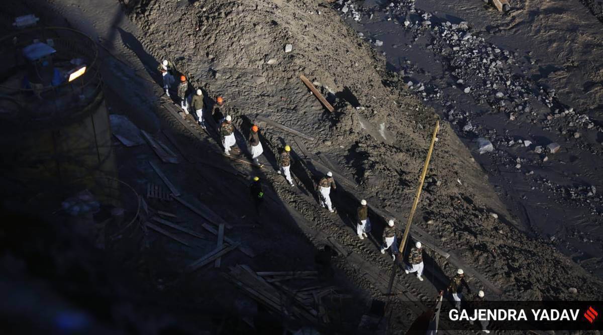 The flood washed away hydroelectric stations and left a large number of labourers trapped, many of them feared dead.