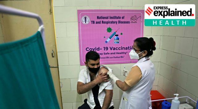 A man receives Covid- 19 vaccine at a government hospital, in New Delhi. (AP Photo/Manish Swarup)
