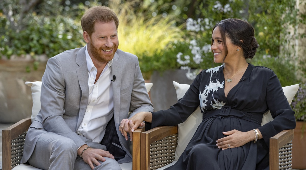 Prince Harry and Meghan during an interview with Oprah Winfrey. (Joe Pugliese/Harpo Productions via AP)