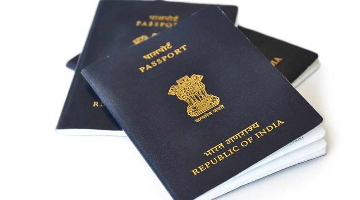 travelling to india with old oci and new passport