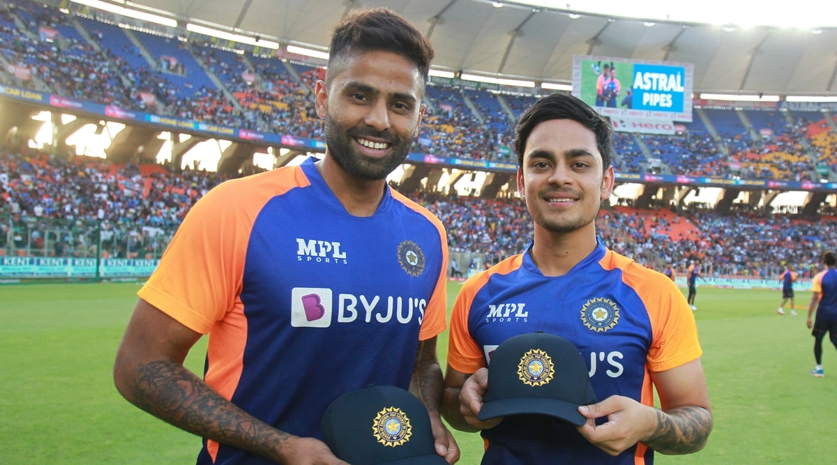 Suryakumar Yadav (L) and Ishan Kishan (R) pose with their international caps. (BCCI)