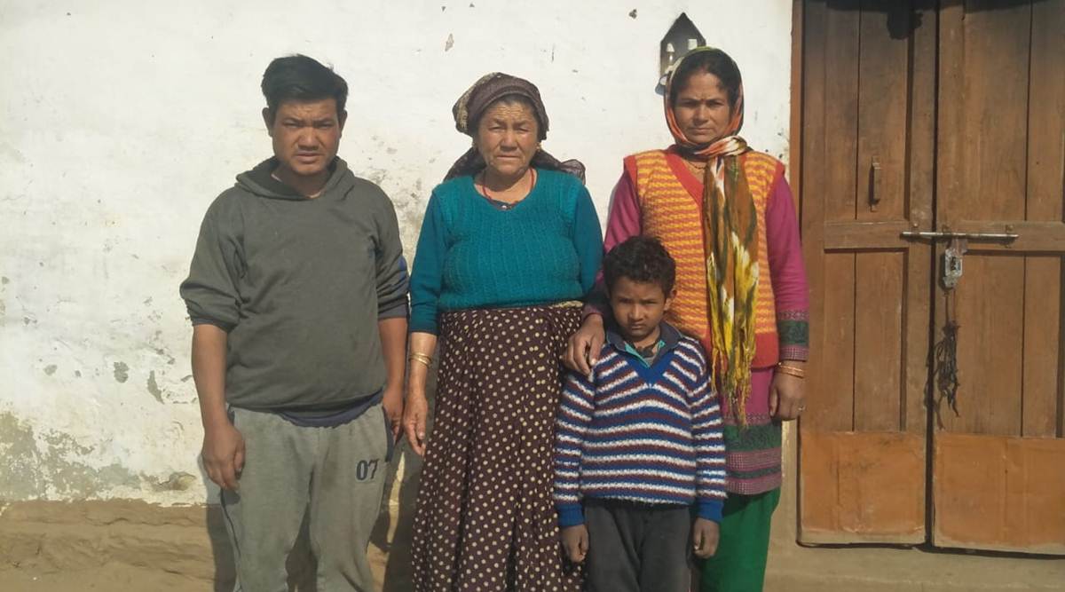 Laxman Singh, family moved into a cowshed after months of sharing one room in temporary accommodation.(Express photo by Lalmani Verma)