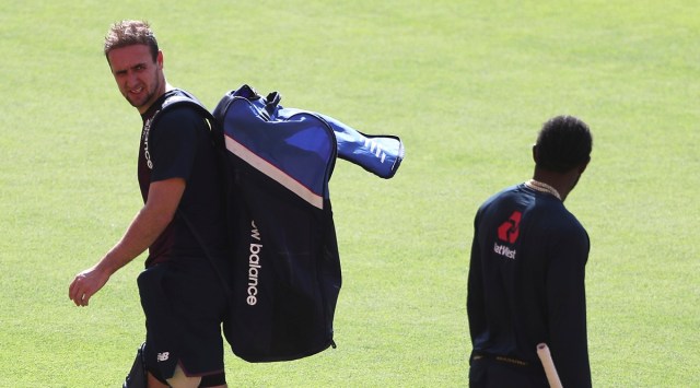 England's Liam Livingstone, left, talks to teammate Jofra Archer as he leaves after attending a training session ahead of the first Twenty20 cricket match between India and England in Ahmedabad, India, Monday, March 8, 2021. (AP Photo/Aijaz Rahi)